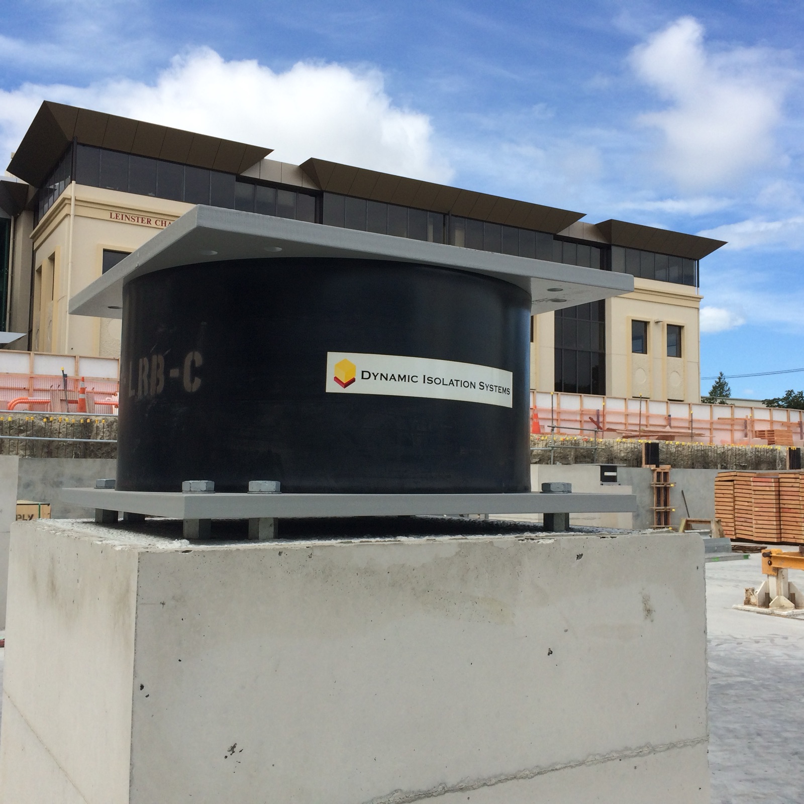 Base isolator installed beneath a building structure